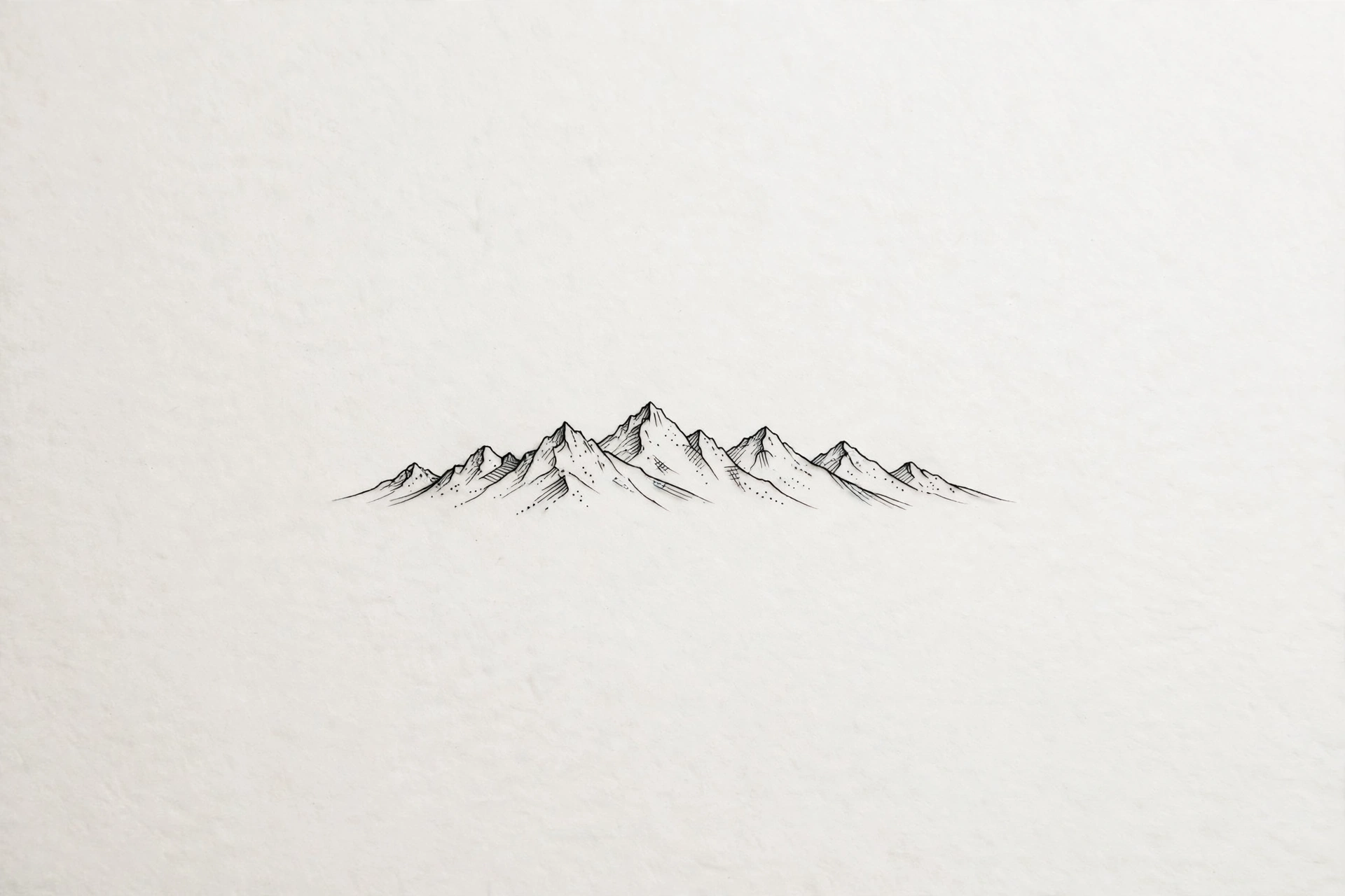 Minimalist mountain range tattoo - small meaningful tattoo idea
