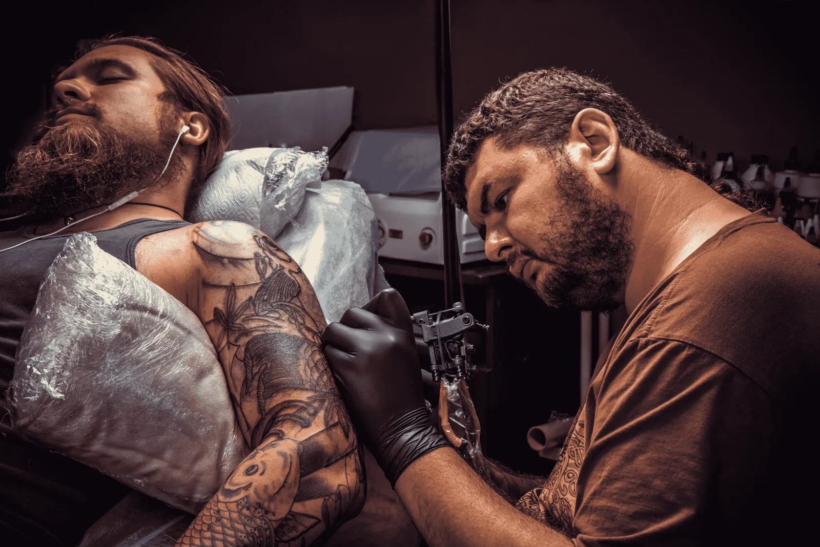 Bold geometric forearm tattoo with sharp angular lines