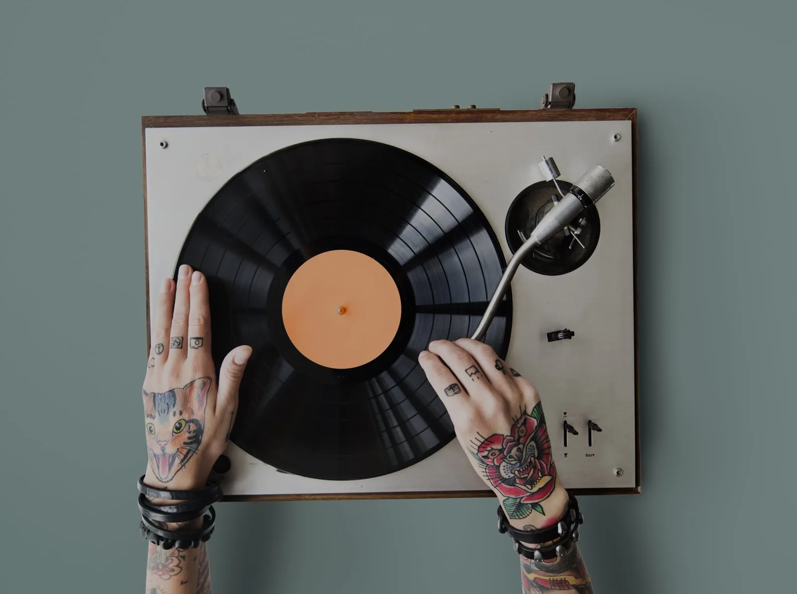 Music-inspired forearm tattoo with notes and instruments