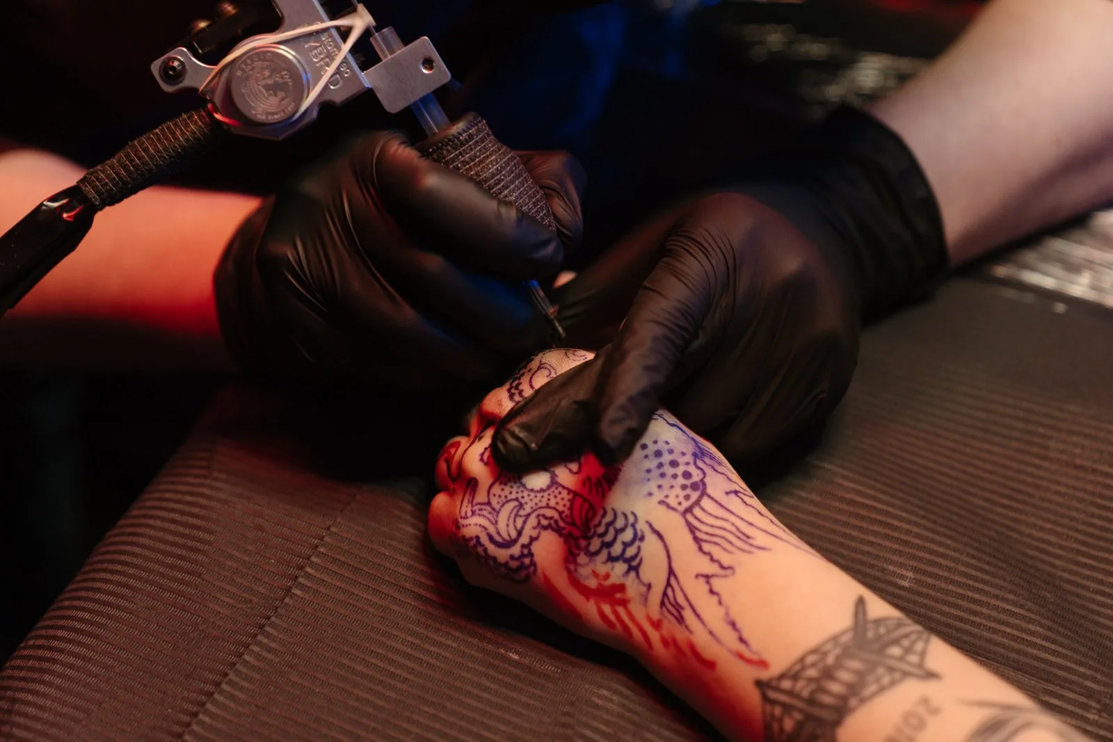 Guardian angel forearm tattoo with spread wings