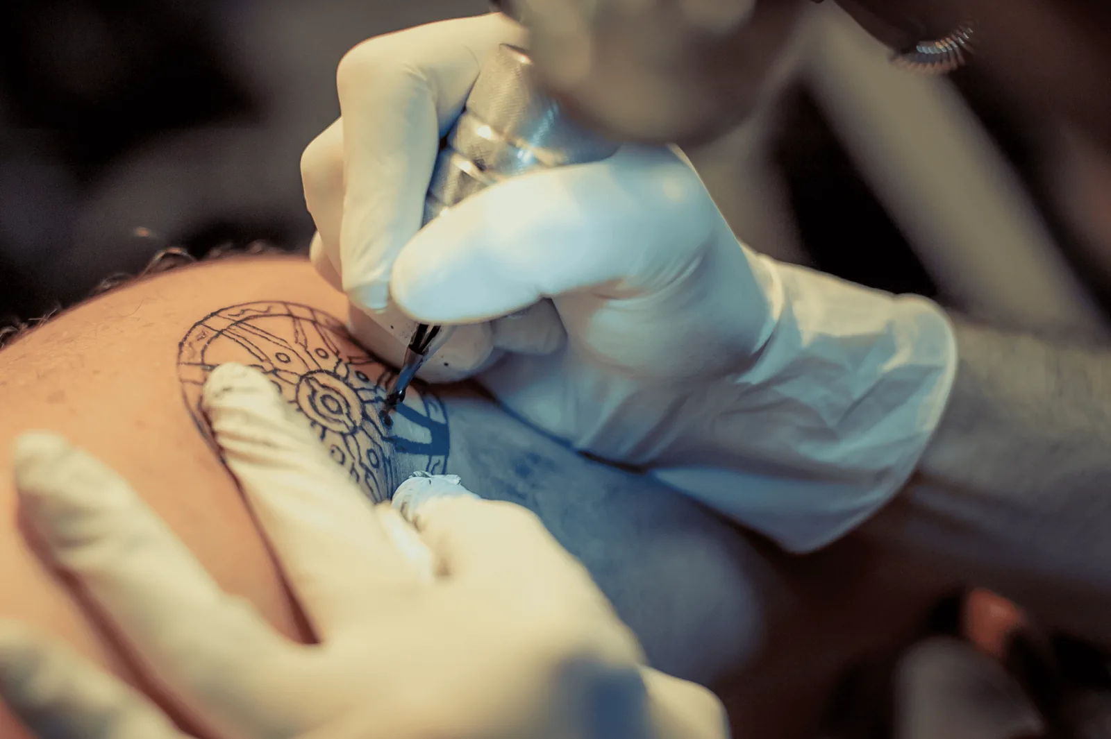 Fallen angel forearm tattoo in dramatic detail