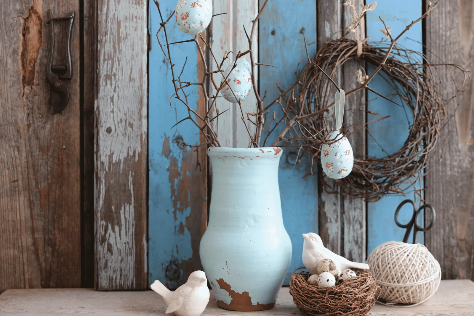 Wreath made of stones, feathers, and driftwood in western style