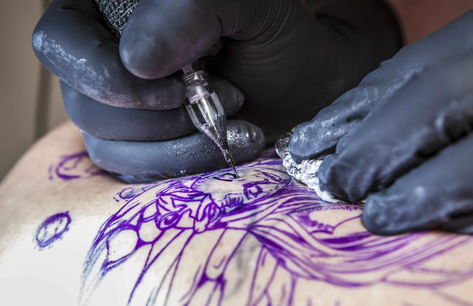 Broken hourglass memento mori tattoo