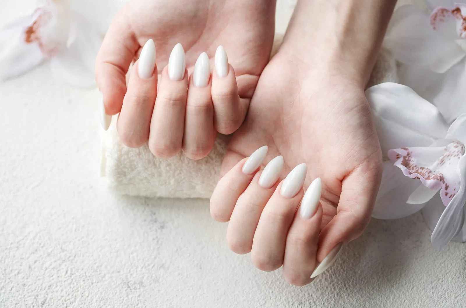 Solid white nails manicure in bright glossy white polish