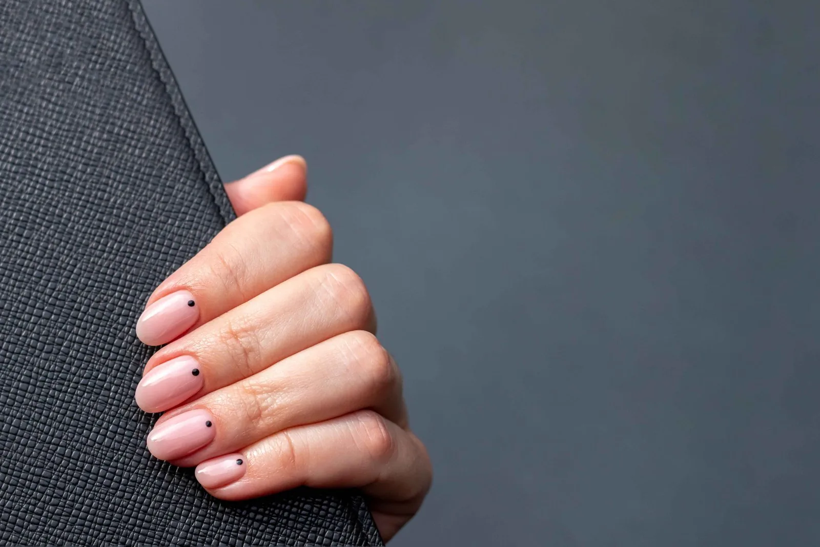 Subtle white marble nails with nude base
