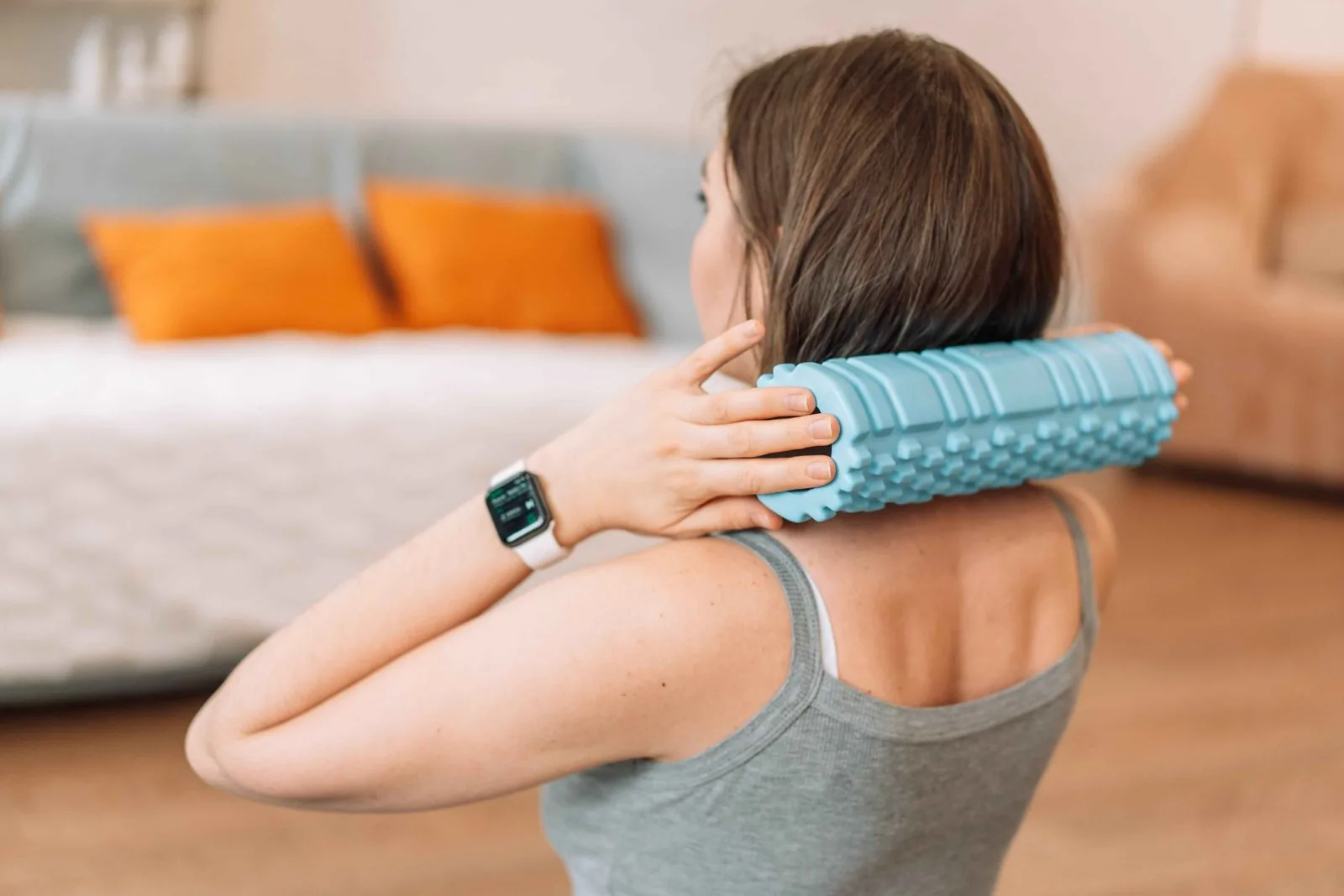 Woman easing neck tension with a soothing massage