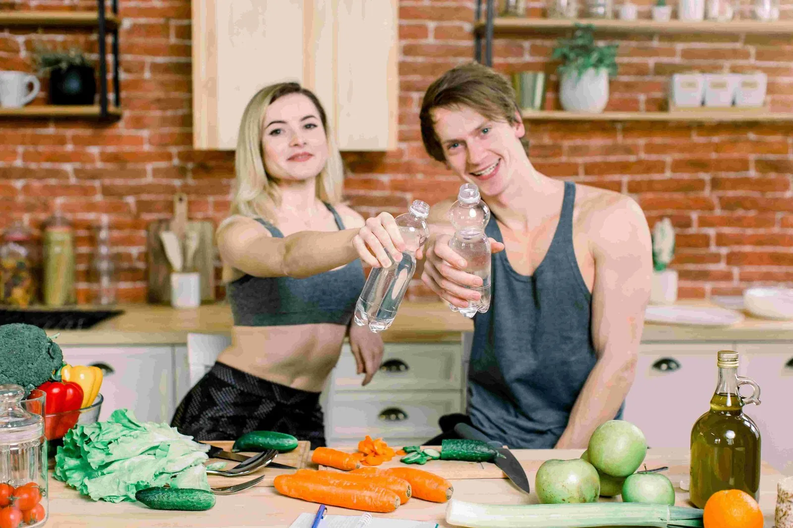 Happy couple sharing a healthy meal together at home