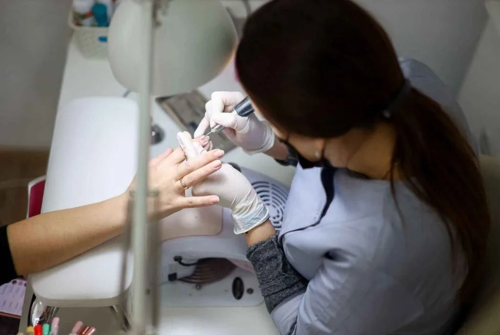 Deep cleaning matte nails with a soft brush