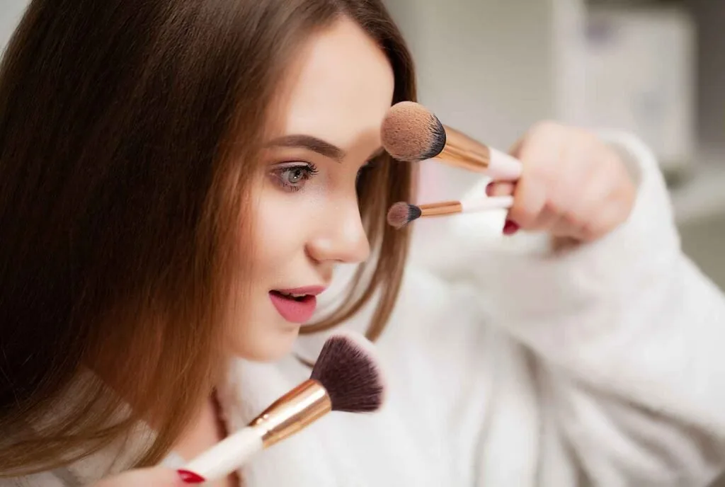 Beginner applying light natural makeup